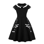 Black swing dress with white bat-shaped collar and embroidered bats on the skirt - view 3
