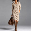 Ribbed knit sweater dress with high button collar and long sleeves, worn with knee-high boots
