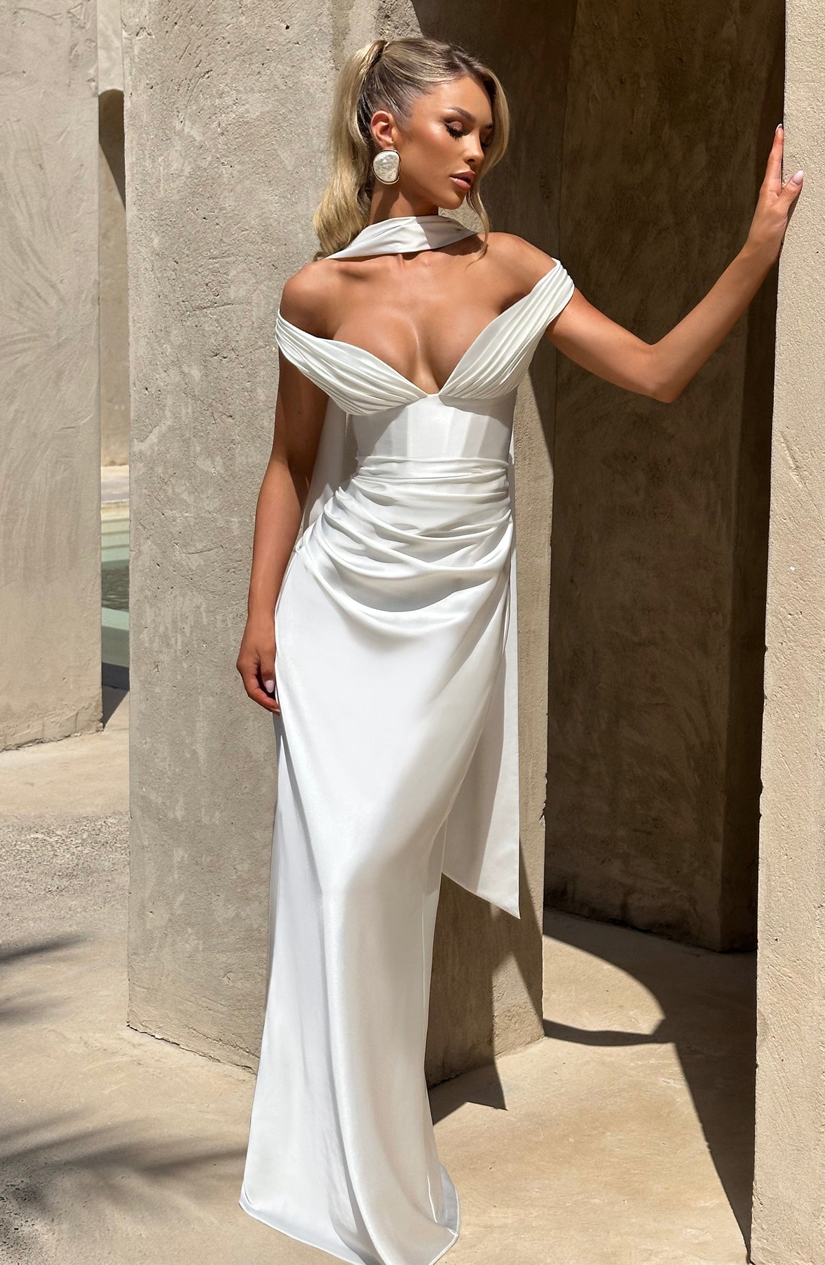 Woman wearing a satin off-shoulder maxi dress with pleated bust and corset bodice - view 11
