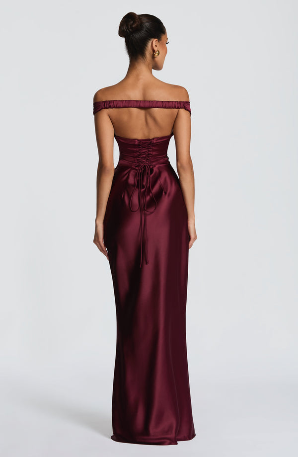 Woman wearing a satin off-shoulder maxi dress with pleated bust and corset bodice - view 15
