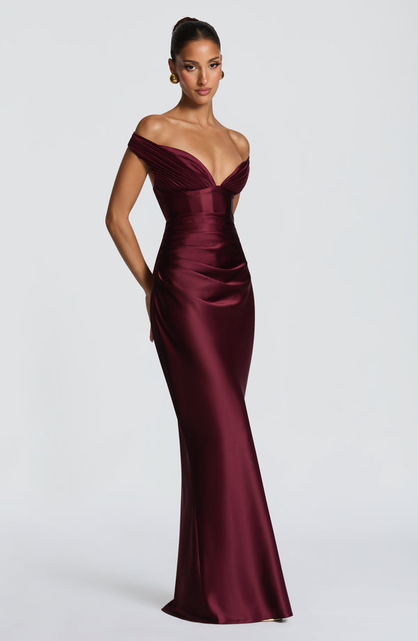 Woman wearing a satin off-shoulder maxi dress with pleated bust and corset bodice - view 16