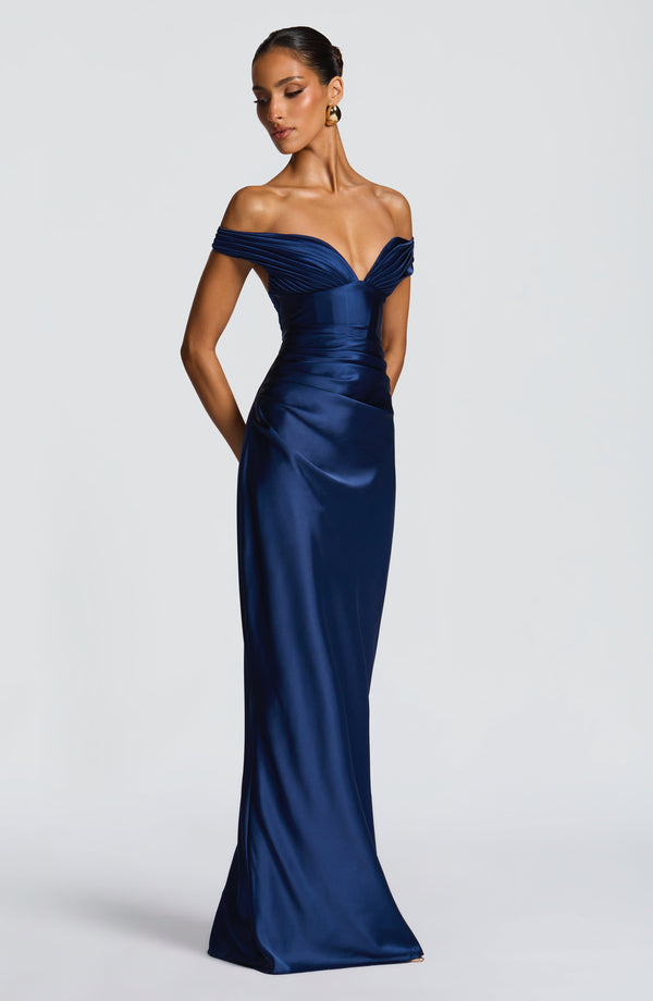 Woman wearing a satin off-shoulder maxi dress with pleated bust and corset bodice - view 19