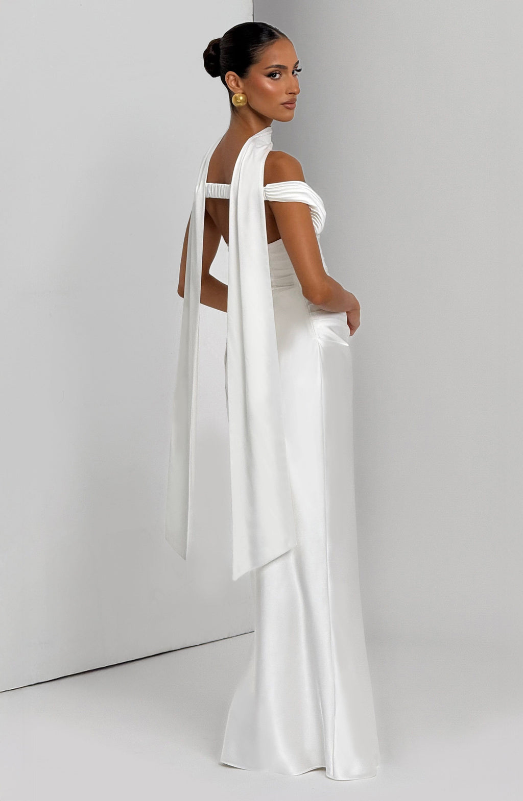 Woman wearing a satin off-shoulder maxi dress with pleated bust and corset bodice - view 6