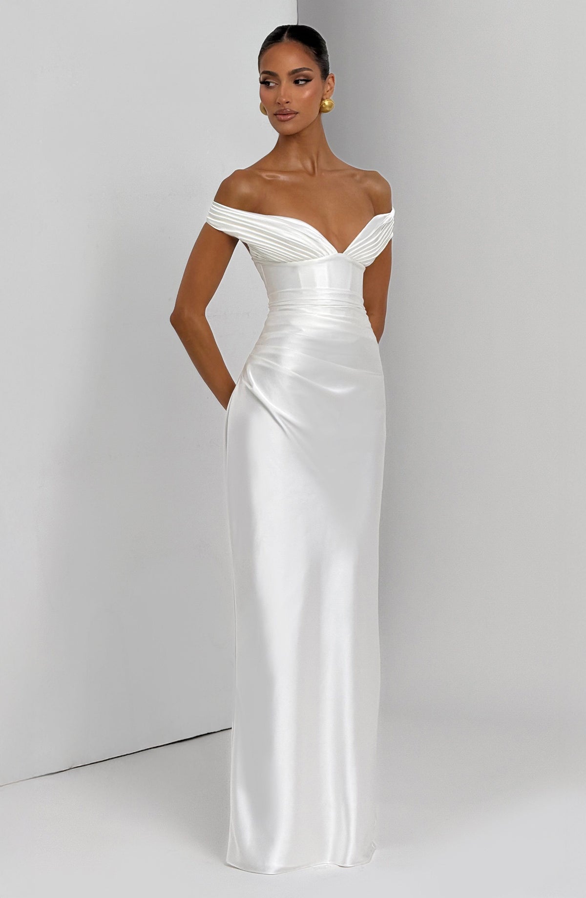 Woman wearing a satin off-shoulder maxi dress with pleated bust and corset bodice - view 8