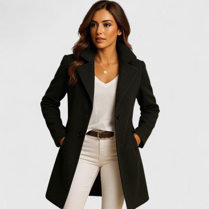 Woman wearing a double-breasted long coat with notched lapels, a tailored womens coat in black, gray and camel