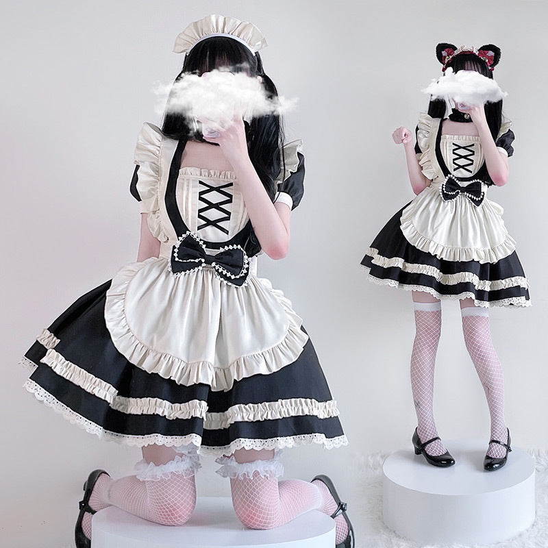 Women's maid Halloween costume with ivory ruffled apron, lace-up bib and bow - view 2