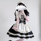 Women's maid Halloween costume with ivory ruffled apron, lace-up bib and bow - view 3