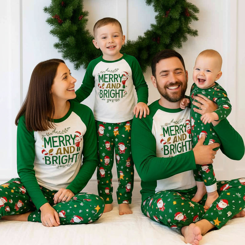 Matching Christmas pajamas with white raglan tee, Merry and Bright graphic and green Santa print pants - view 3