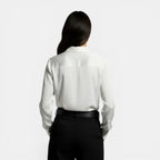 Relaxed satin collared shirt with button front worn tucked in - view 9