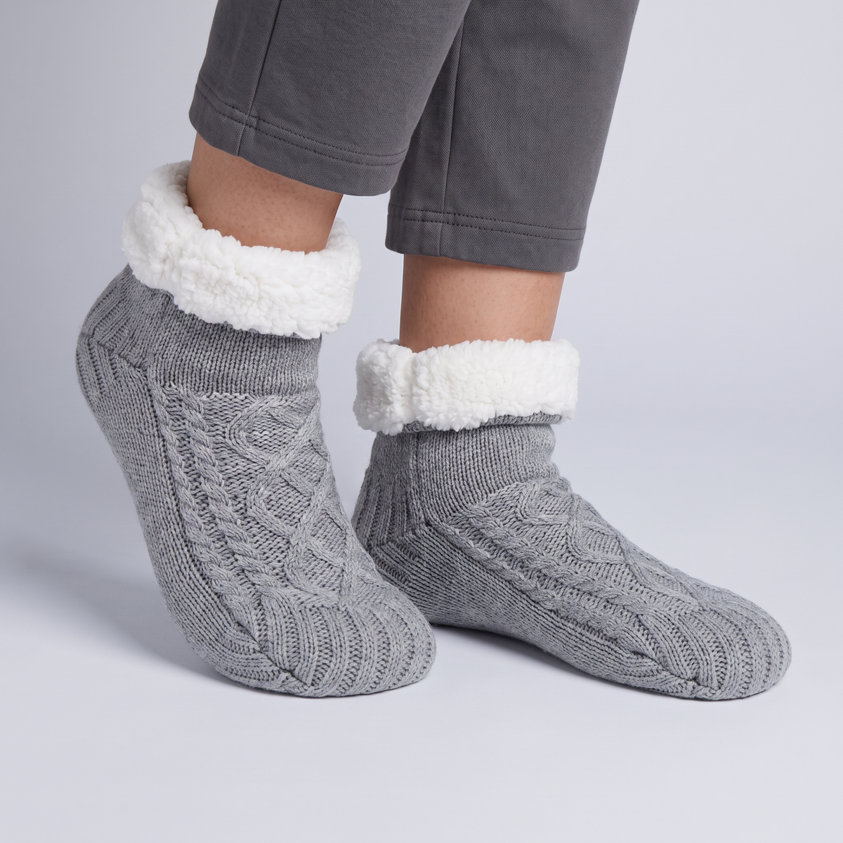 Fleece-lined cable knit slippers for women with plush fold-over cuff