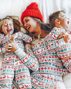 Matching family Christmas pajamas with red and green reindeer and snowflake print and gray ribbed cuffs - view 2