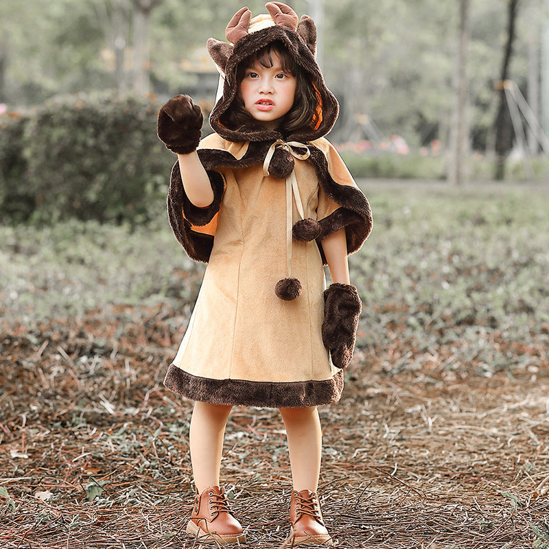 Girl wearing a deer Halloween costume with antler hood cape, faux fur trimmed dress and mittens