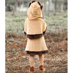 Girl wearing a deer Halloween costume with antler hood cape, faux fur trimmed dress and mittens - view 4