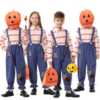 Kids scarecrow pumpkin Halloween costume with striped shirt, patched blue suspender pants and orange pumpkin headpiece