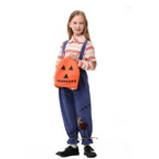 Kids scarecrow pumpkin Halloween costume with striped shirt, patched blue suspender pants and orange pumpkin headpiece - view 2