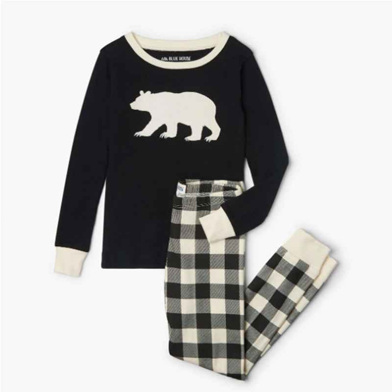 Matching Christmas pajamas with polar bear print tops and black and cream plaid pants - view 6