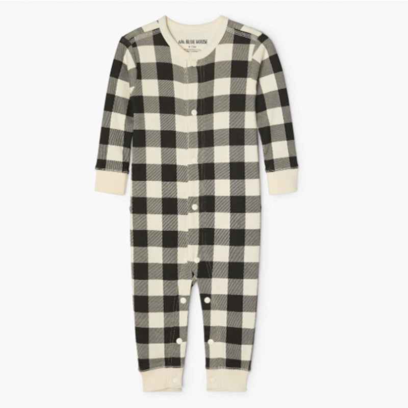 Matching Christmas pajamas with polar bear print tops and black and cream plaid pants - view 7