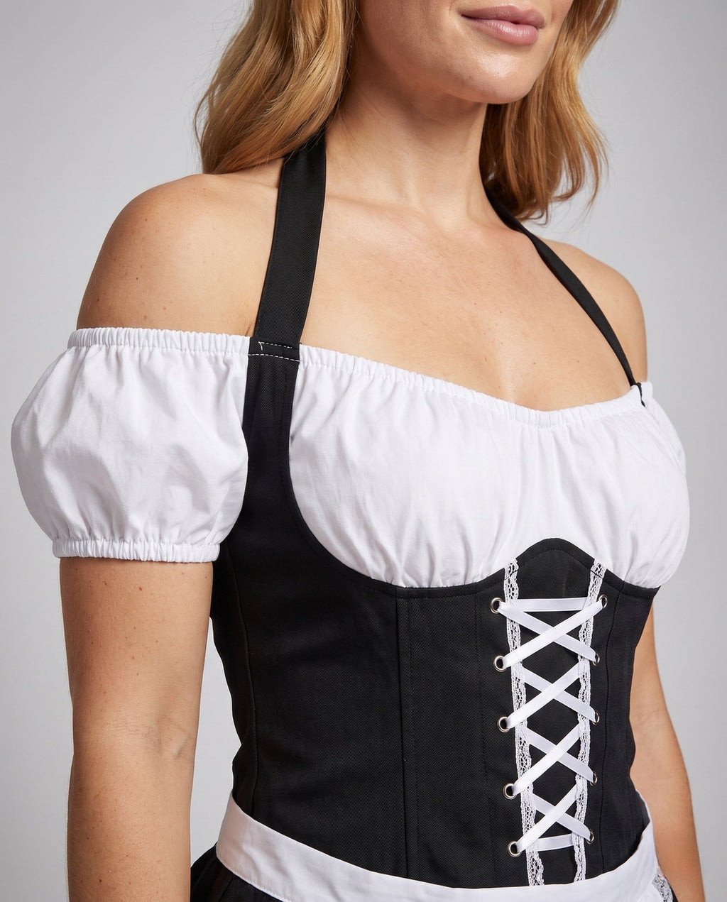 Women's black and white maid costume with lace-up corset bodice, puff sleeves and lace-trimmed apron - view 2