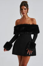 Black off-shoulder mini dress with faux fur bardot neckline and faux fur cuffs