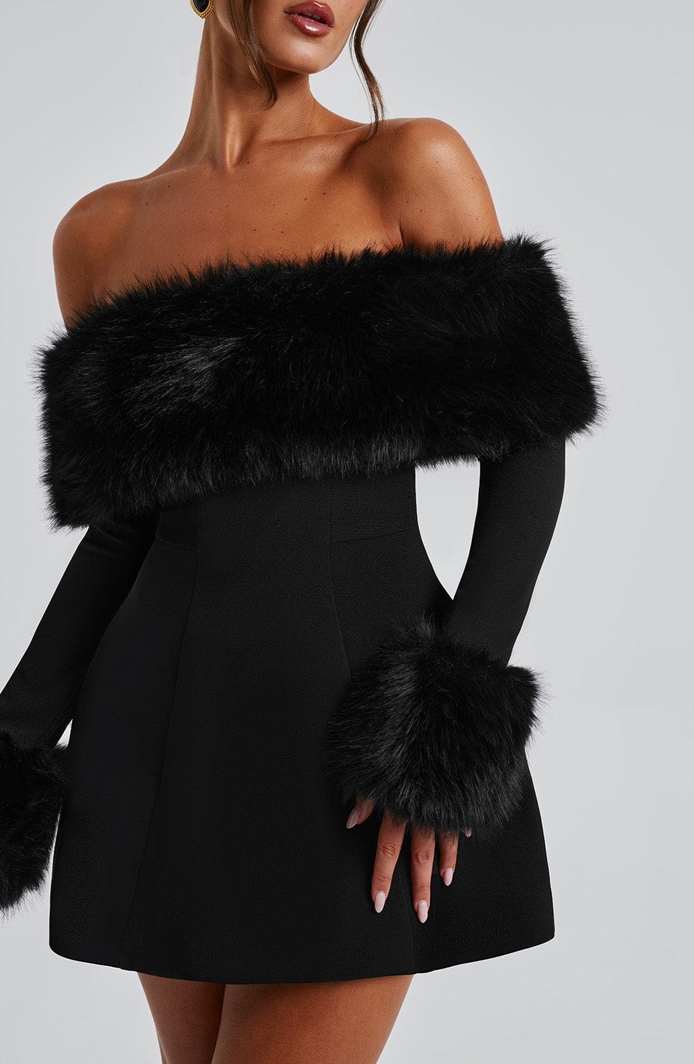 Black off-shoulder mini dress with faux fur bardot neckline and faux fur cuffs - view 2