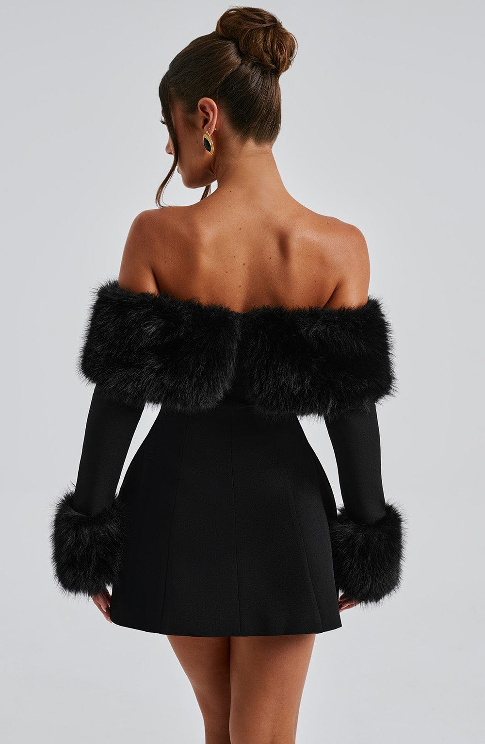 Black off-shoulder mini dress with faux fur bardot neckline and faux fur cuffs - view 3