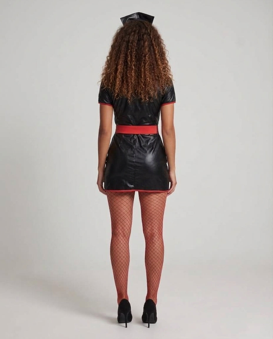 Woman wearing black leather-look nurse costume mini dress with red piping, red belt and nurse hat - view 3