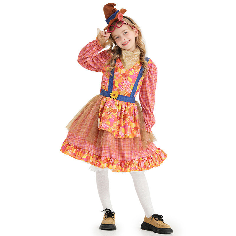 Girl wearing a pink plaid scarecrow Halloween costume dress with patchwork apron, sunflower and mini hat - view 5