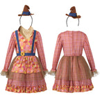 Girl wearing a pink plaid scarecrow Halloween costume dress with patchwork apron, sunflower and mini hat - view 6