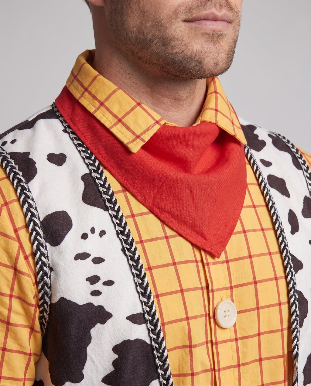 Cowboy Halloween costume set with yellow plaid shirt, cow print vest, red bandana and dark denim-look pants - view 2