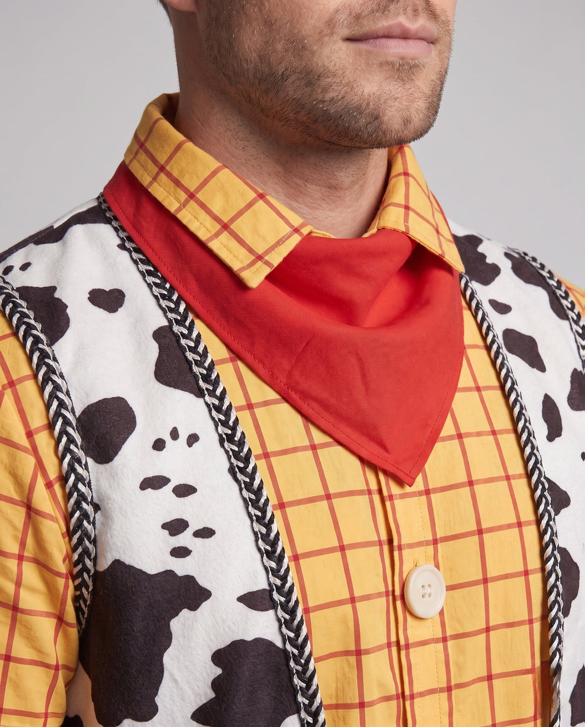 Cowboy Halloween costume set with yellow plaid shirt, cow print vest, red bandana and dark denim-look pants - view 2