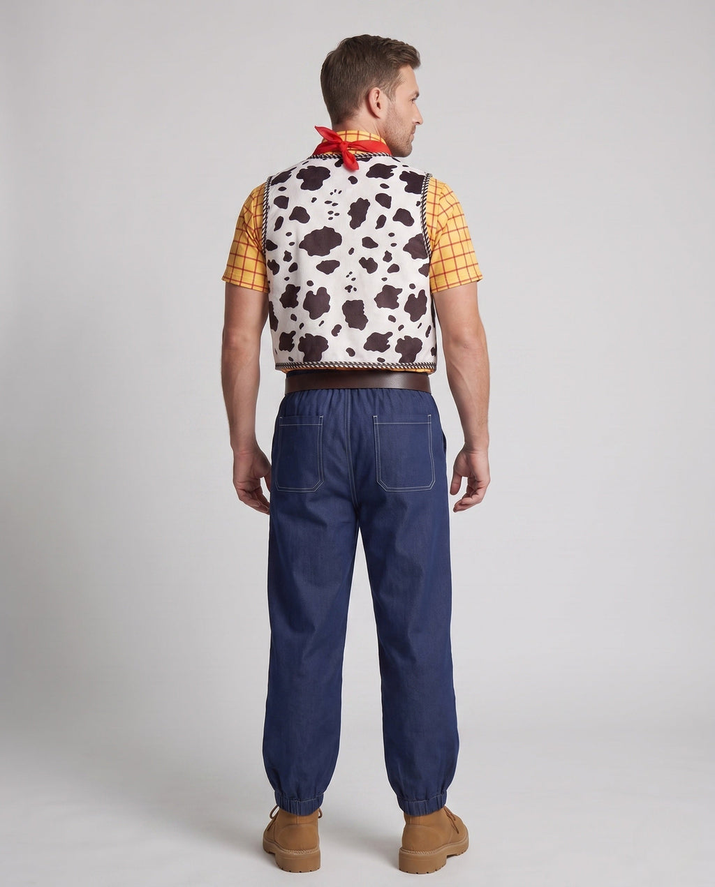 Cowboy Halloween costume set with yellow plaid shirt, cow print vest, red bandana and dark denim-look pants - view 3