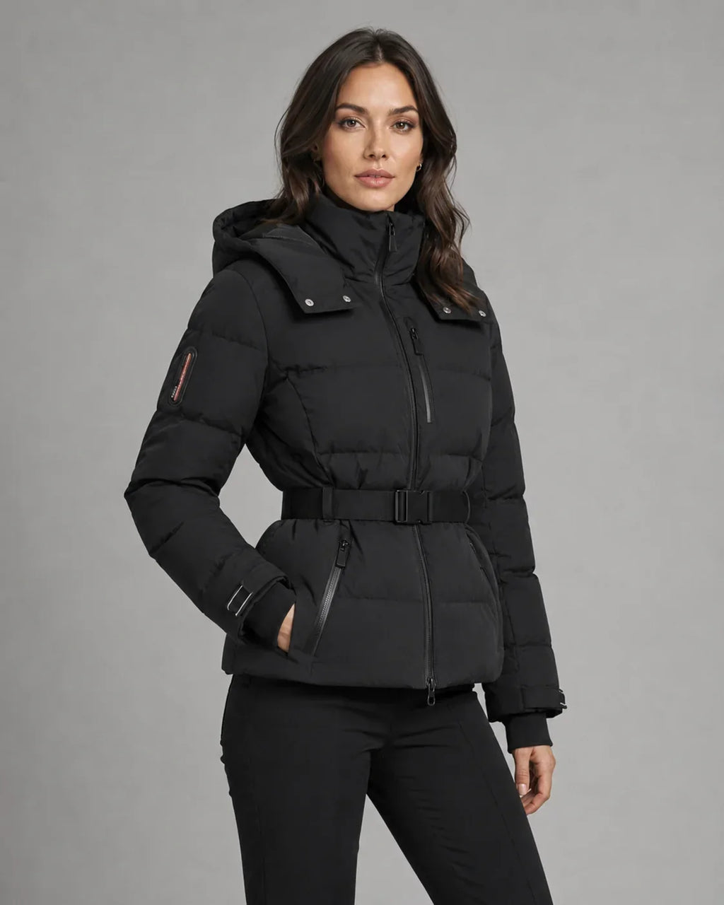Women's black hooded puffer jacket with waist belt and cuff tabs - view 3