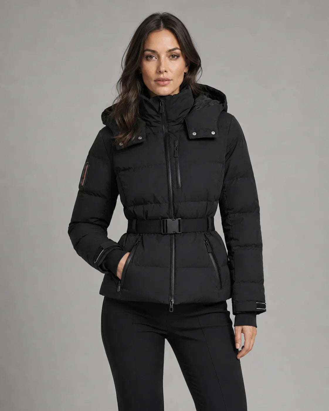 Women's black hooded puffer jacket with waist belt and cuff tabs - view 4