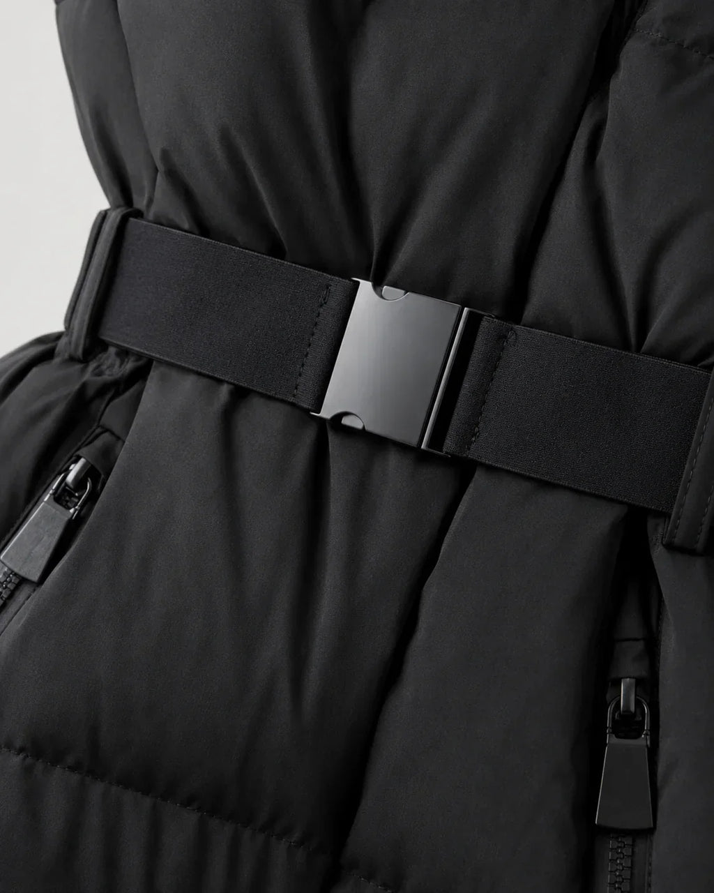 Women's black hooded puffer jacket with waist belt and cuff tabs - view 6