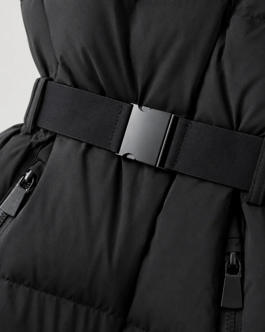 Women's black hooded puffer jacket with waist belt and cuff tabs - view 6