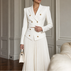 White two-piece set with padded-shoulder cropped blazer and long pleated skirt