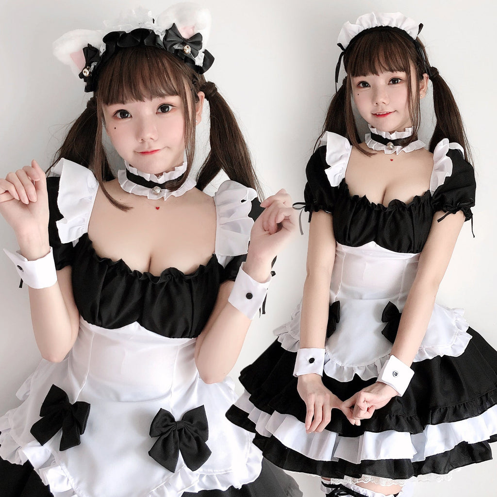 Black and white ruffled maid Halloween costume dress with puff sleeves, bow apron and tiered skirt - view 2