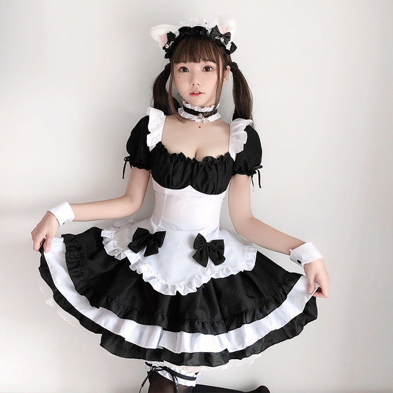 Black and white ruffled maid Halloween costume dress with puff sleeves, bow apron and tiered skirt - view 3