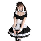 Black and white ruffled maid Halloween costume dress with puff sleeves, bow apron and tiered skirt - view 5