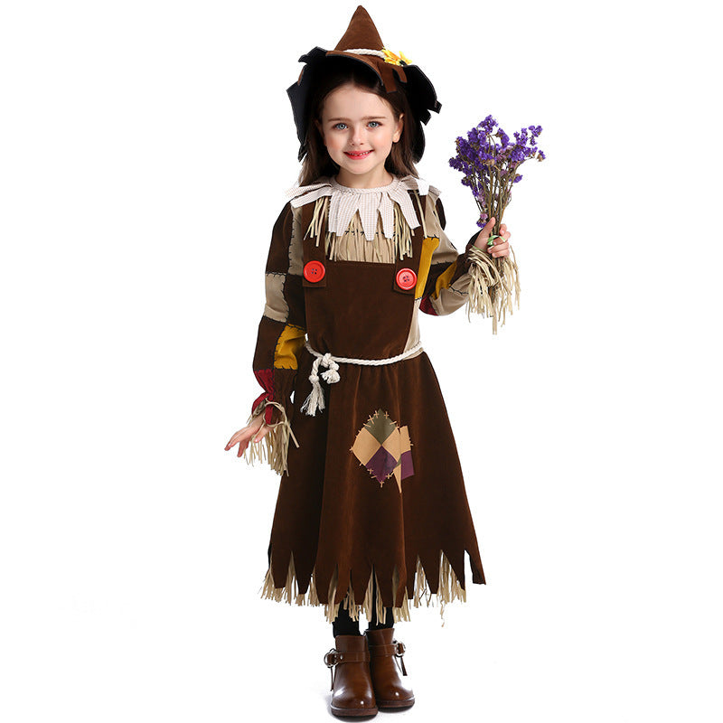 Girls brown scarecrow Halloween costume dress with patchwork sleeves, fringe trim, rope belt and pointed sunflower hat