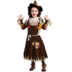 Girls brown scarecrow Halloween costume dress with patchwork sleeves, fringe trim, rope belt and pointed sunflower hat - view 4
