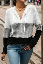 Colorblock quarter zip hoodie in white, gray and black ribbed knit sweater with drawstring hood