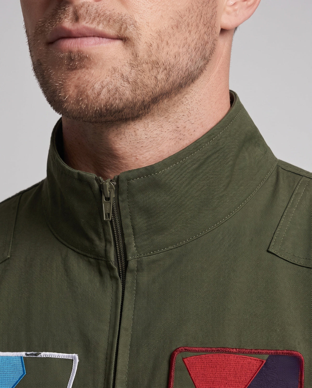 Men's olive green flight suit Halloween costume with embroidered patches and front zip - view 2