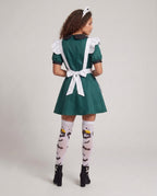 Woman wearing green Halloween costume dress with white bat-print ruffled apron - view 3