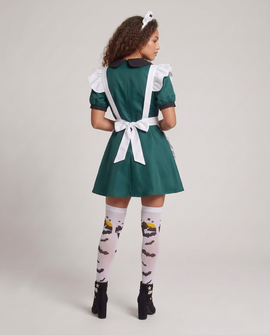 Woman wearing green Halloween costume dress with white bat-print ruffled apron - view 3