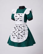 Woman wearing green Halloween costume dress with white bat-print ruffled apron - view 4