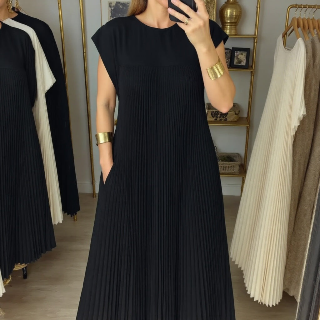 Woman wearing a pleated cap sleeve maxi dress with crew neck - view 11