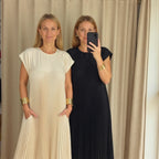 Woman wearing a pleated cap sleeve maxi dress with crew neck - view 13