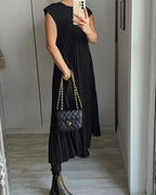 Woman wearing a pleated cap sleeve maxi dress with crew neck - view 19