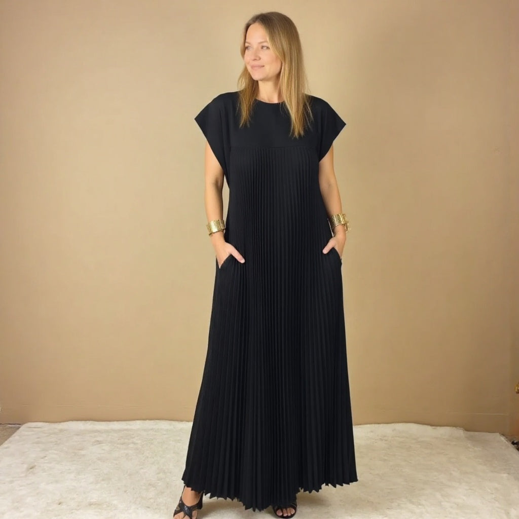 Woman wearing a pleated cap sleeve maxi dress with crew neck - view 9